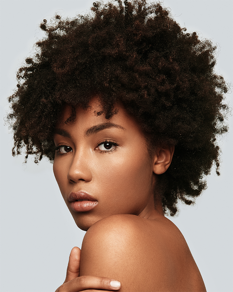 A woman with curly hair.